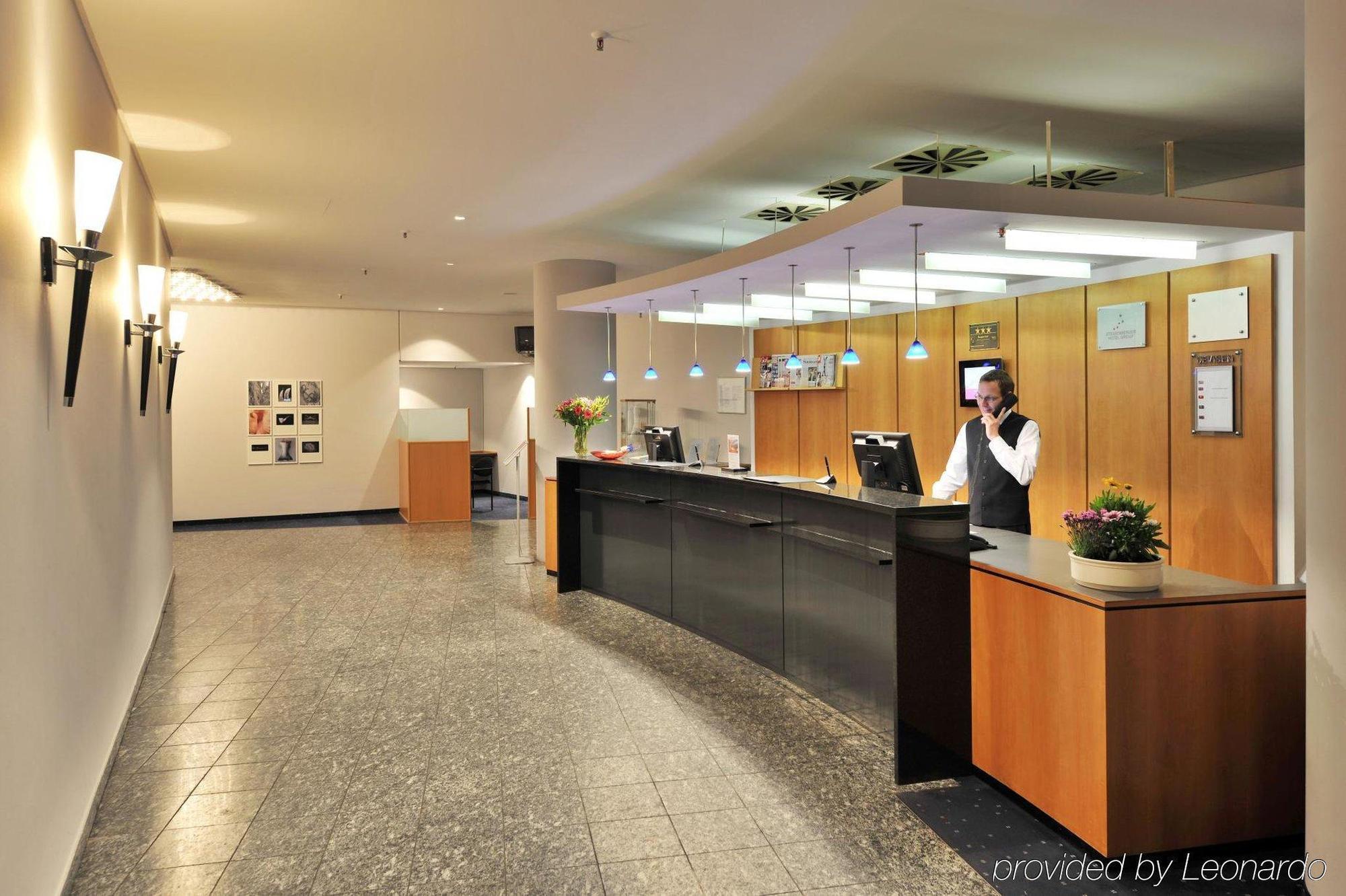 Intercityhotel Киль Интерьер фото
